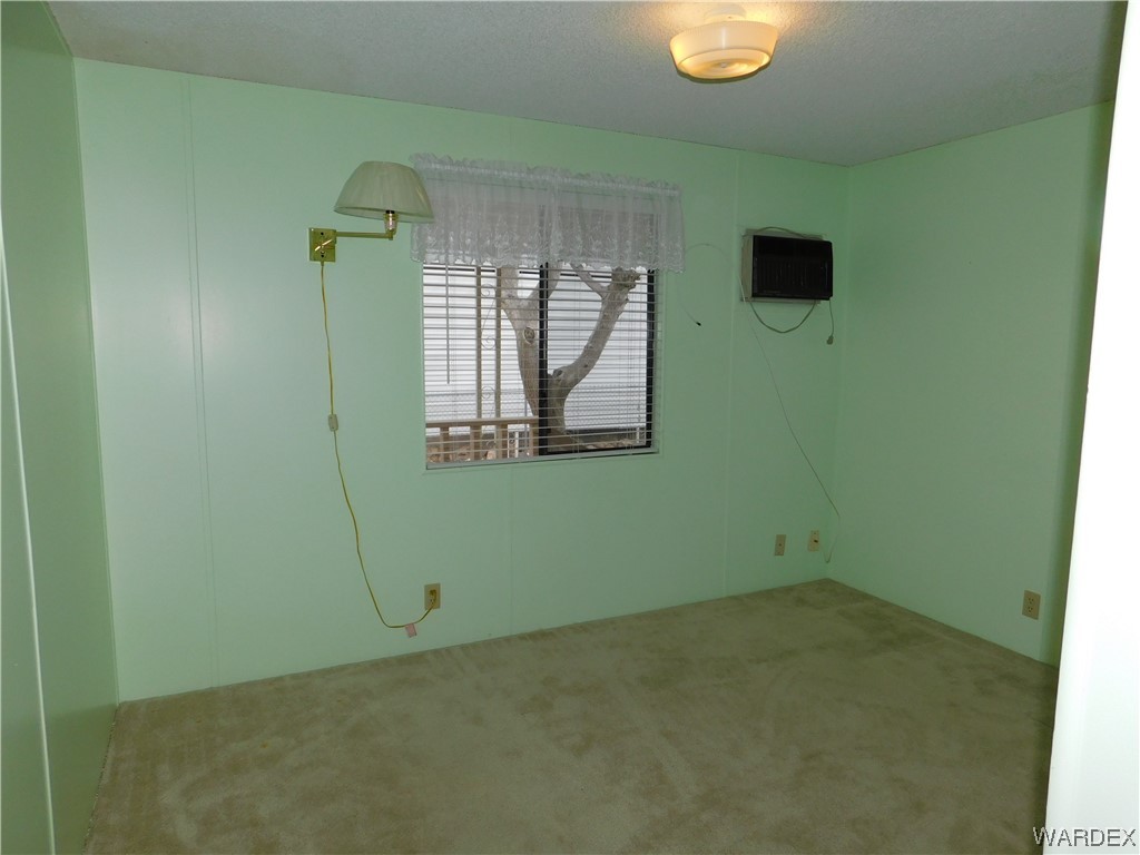 3003 Hualapai Mountain Road, Unit 55 Kingman, AZ 86401 - Photo 35 of 38 a view of a livingroom with a window