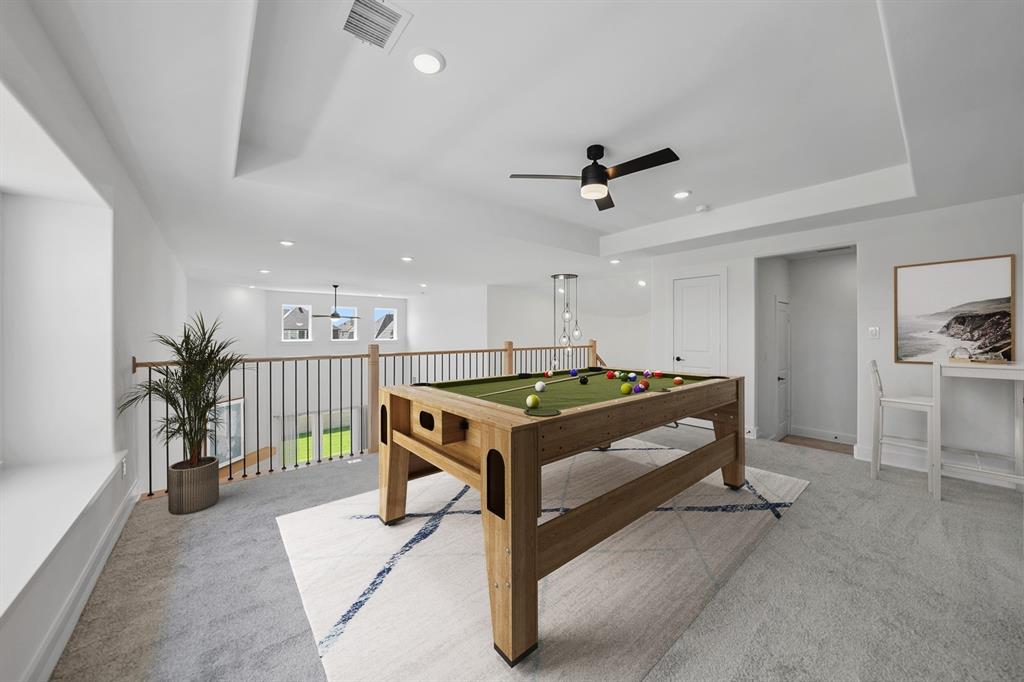 587 Mayfair Lane Frisco, TX 75033 - Photo 36 of 37 a room with furniture and a table