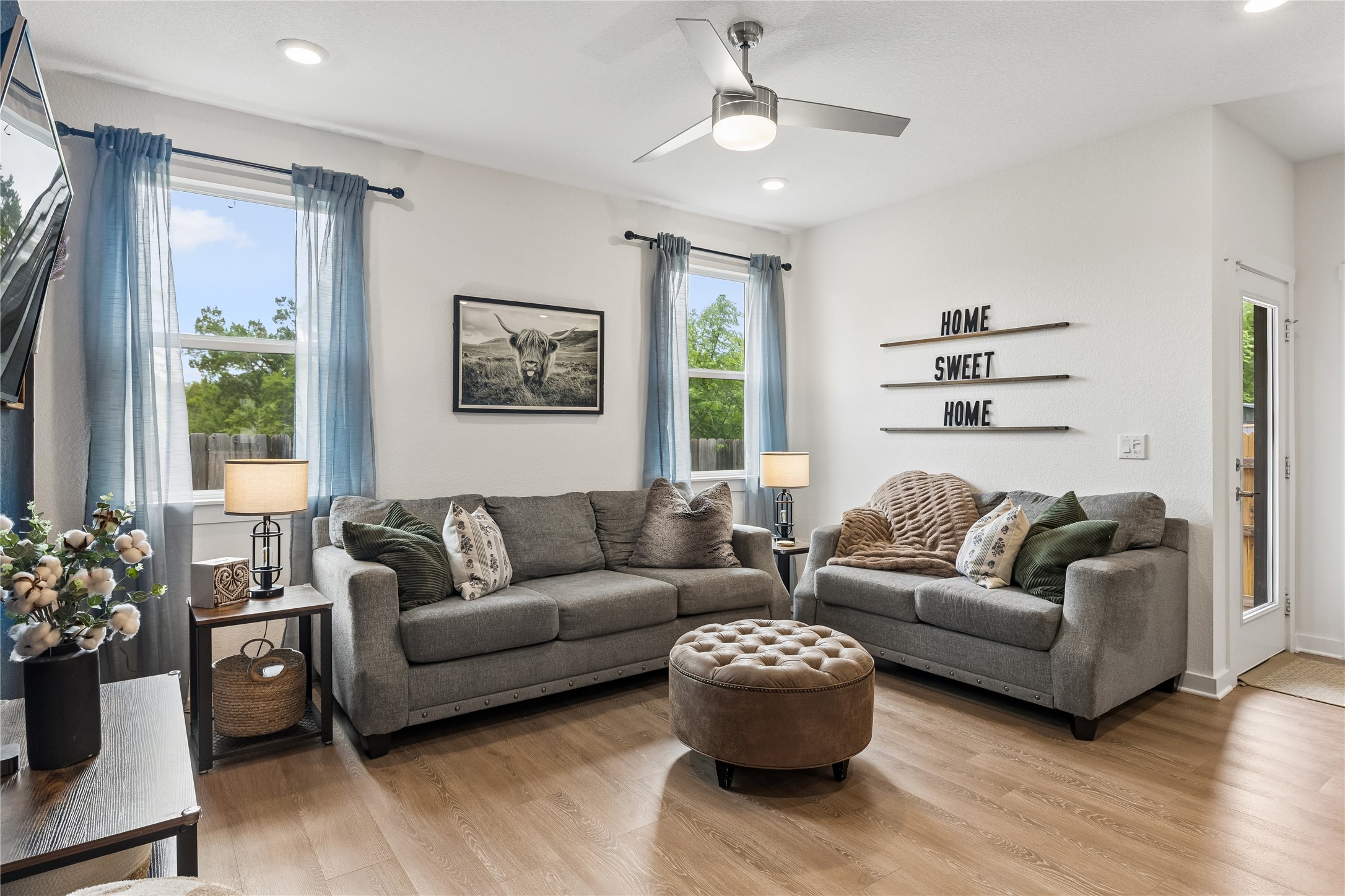 249 Century Plant Road Leander, TX 78641 - Photo 8 of 22 a living room with furniture and a large window