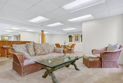 a dining room with a table chairs and wooden floor