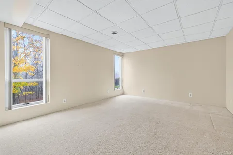 a view of balcony with wooden floor