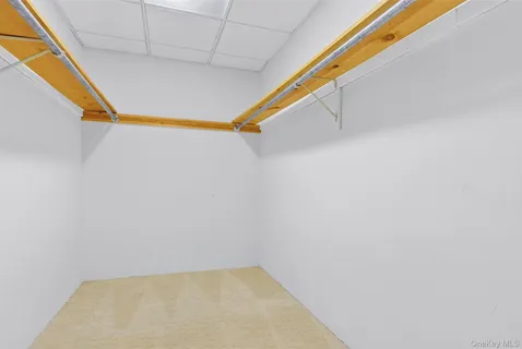 a view of a two chairs in the balcony