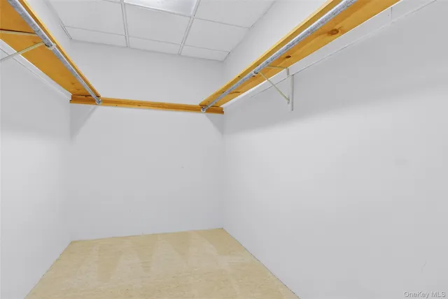 a view of a two chairs in the balcony