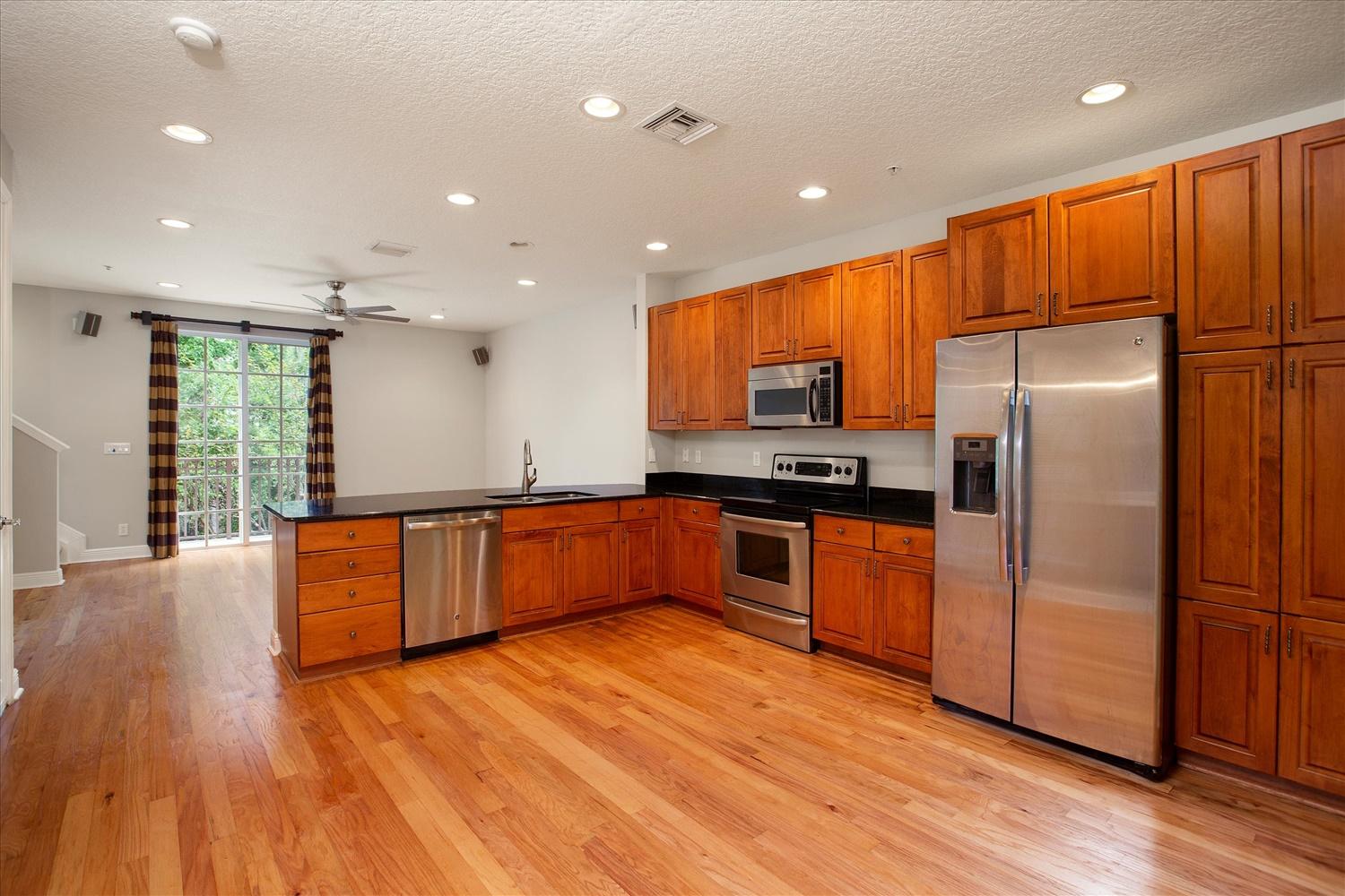 128 Morning Dew Circle Jupiter, FL 33458 - Photo 15 of 46 Kitchen w/Living Room