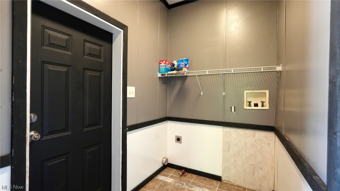 70871 Angus Road Cambridge, OH 43725 - Photo 13 of 29 Laundry area with light tile flooring