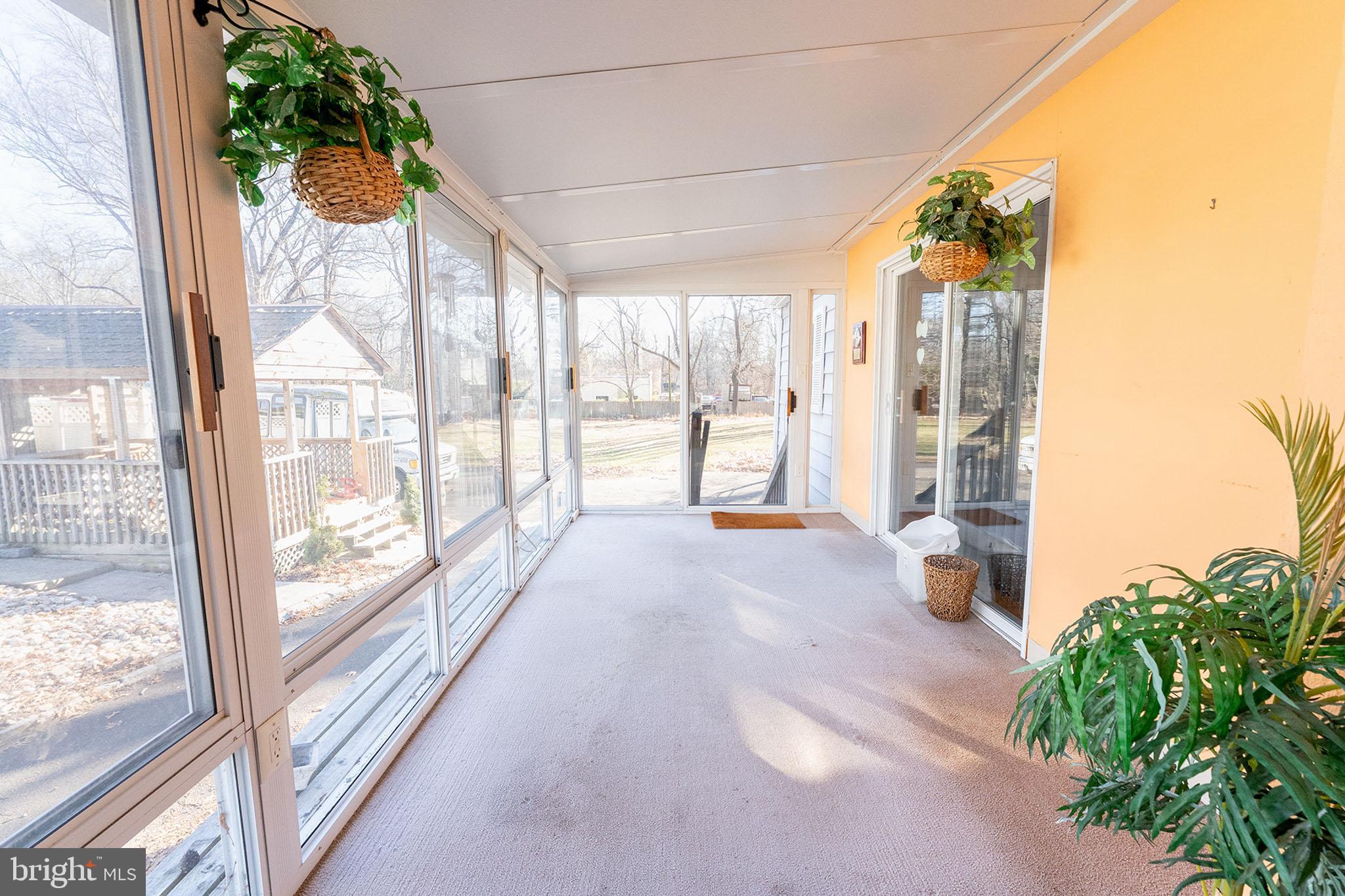513 Eggert Crossing Road Ewing, NJ 08638 - Photo 15 of 36 a view of a room with window and floor to ceiling window