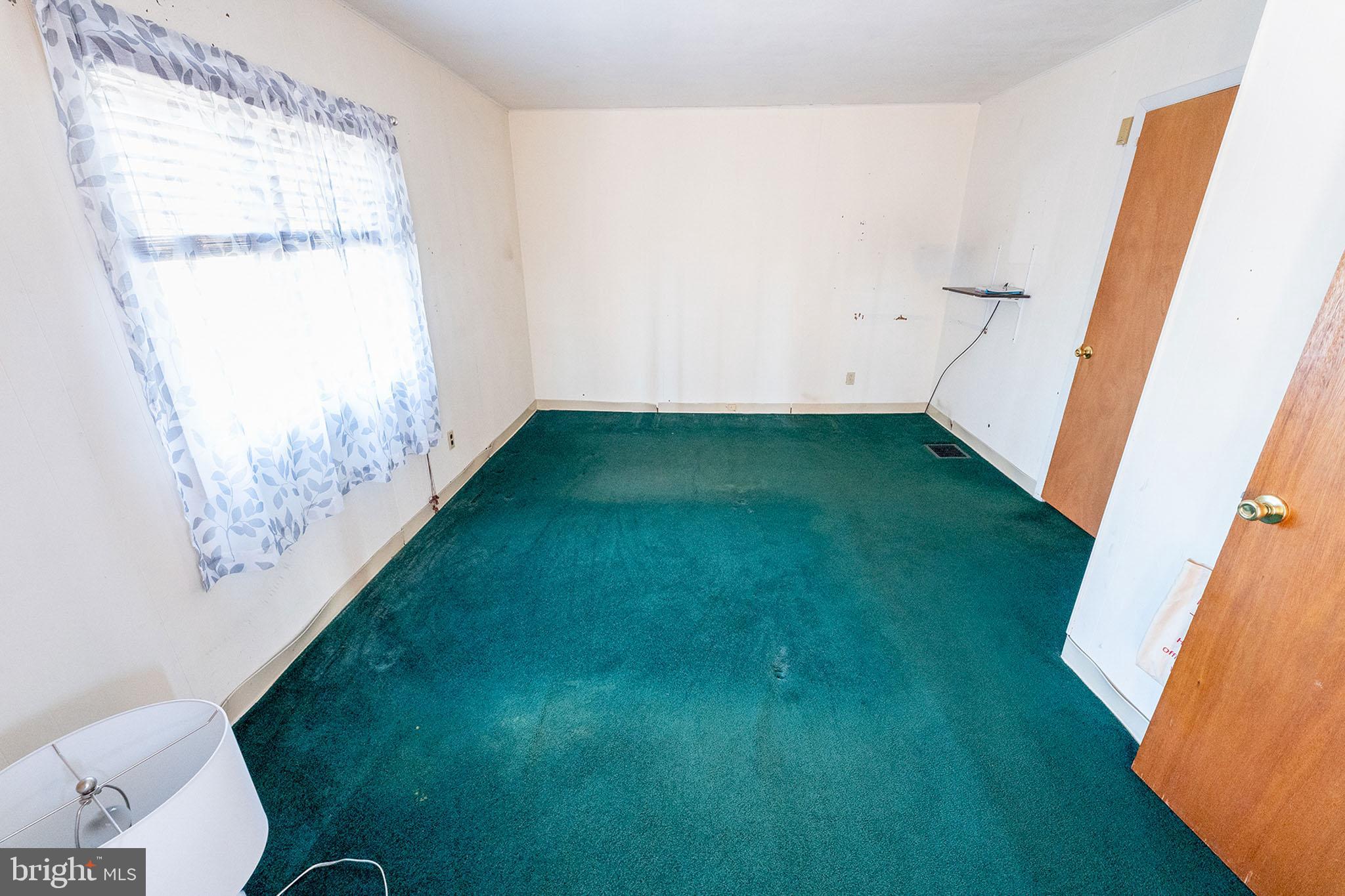 513 Eggert Crossing Road Ewing, NJ 08638 - Photo 18 of 36 a view of a room with rack on the wall