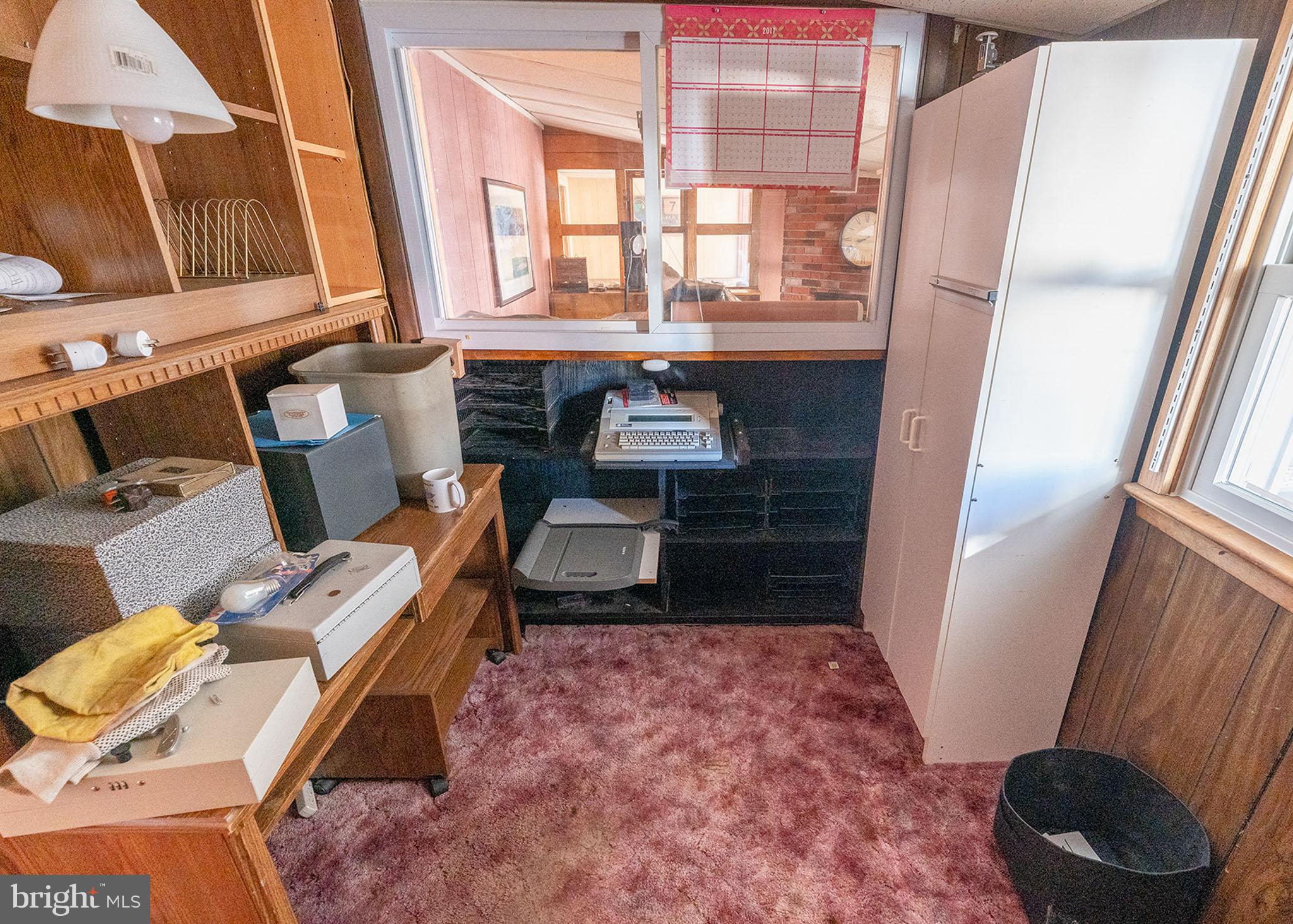 513 Eggert Crossing Road Ewing, NJ 08638 - Photo 25 of 36 a living room with furniture and a fireplace