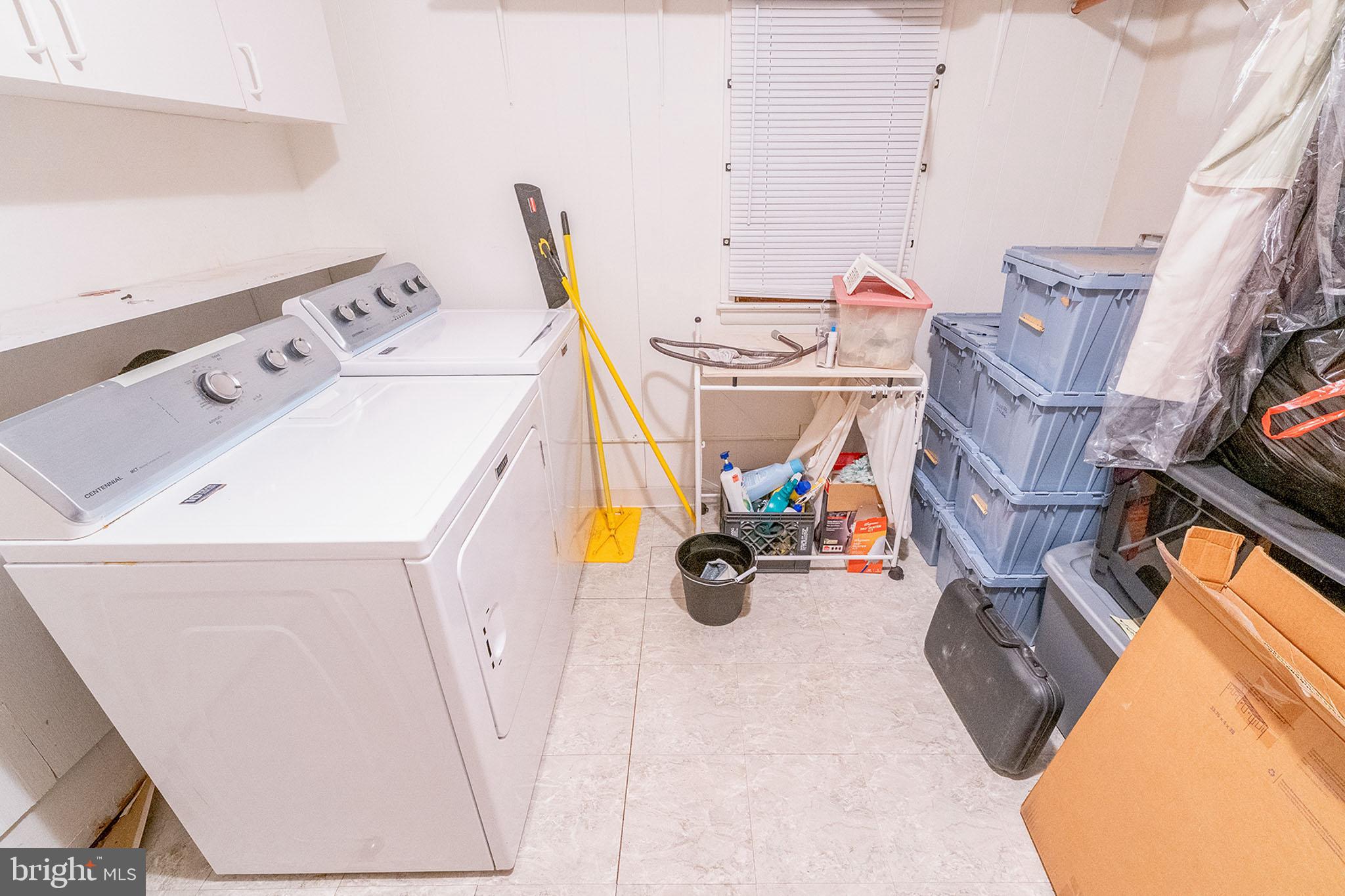 513 Eggert Crossing Road Ewing, NJ 08638 - Photo 27 of 36 a utility room with dryer and washer