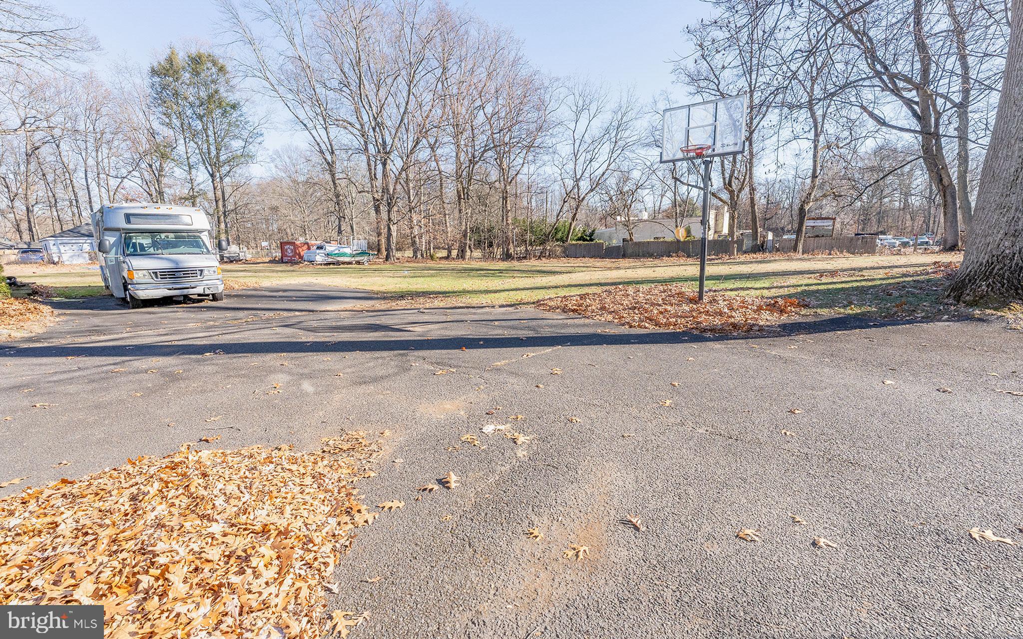 513 Eggert Crossing Road Ewing, NJ 08638 - Photo 32 of 36 a view of road with large trees