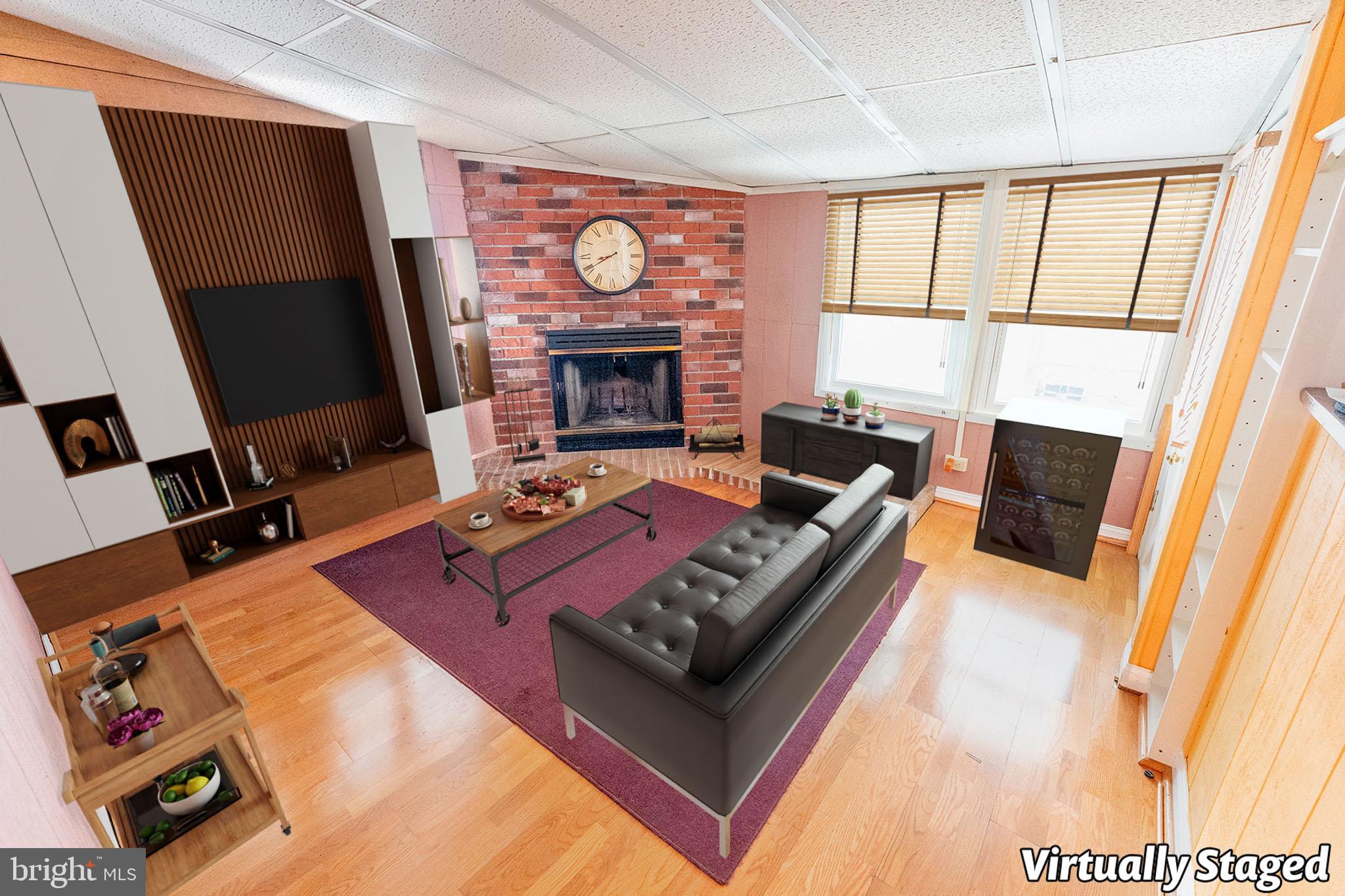 513 Eggert Crossing Road Ewing, NJ 08638 - Photo 5 of 36 a living room with furniture and a fireplace