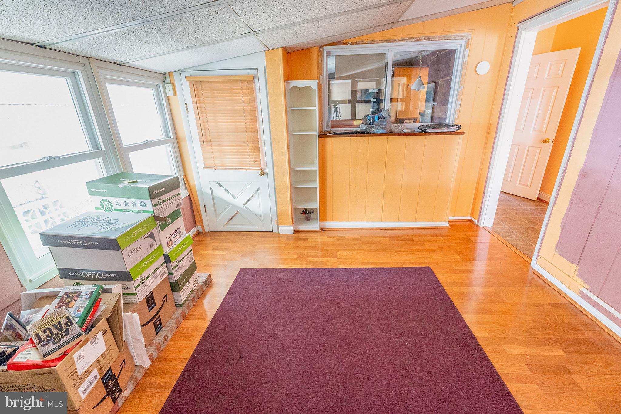 513 Eggert Crossing Road Ewing, NJ 08638 - Photo 7 of 36 a view of an empty room with a window