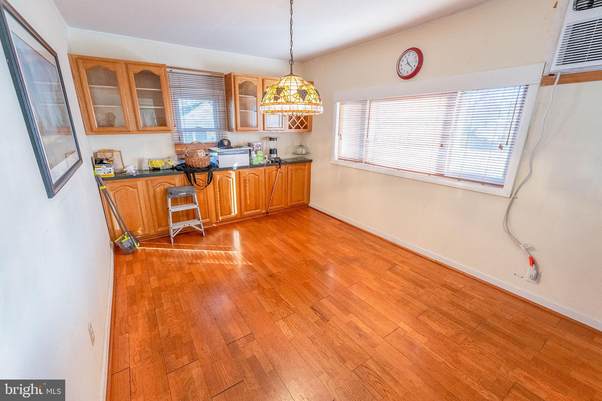 513 Eggert Crossing Road Ewing, NJ 08638 - Photo 9 of 36 a view of a kitchen with furniture and windows