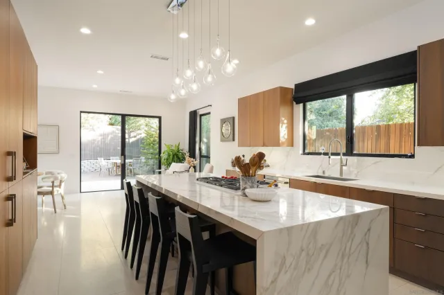 a bedroom with bed and window