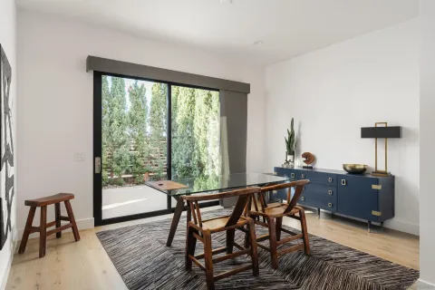 a en suite bathroom with a toilet sink and mirror
