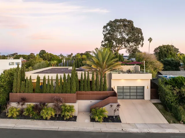 a view of swimming pool with a patio