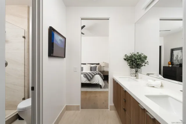 a bedroom with furniture and a bed