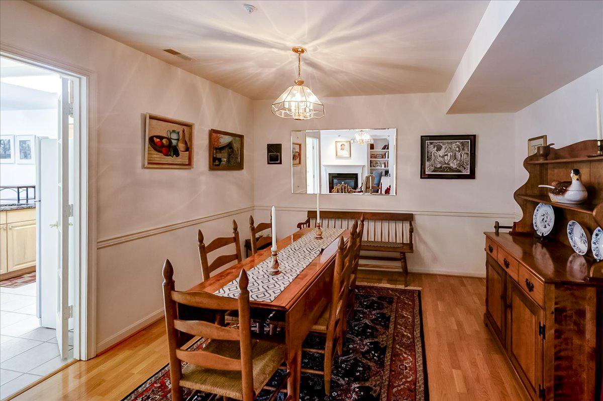 12320 Rosslare Ridge Road, Unit 201 Lutherville-Timonium, MD 21093 - Photo 19 of 41 Dining room features chair molding througout!