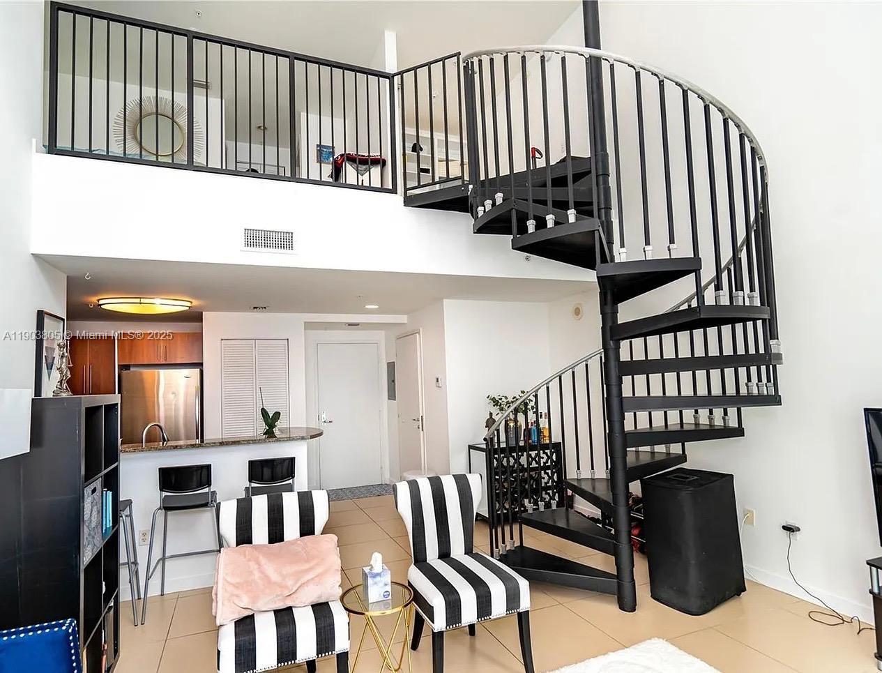 300 South Biscayne Boulevard, Unit L1208 Miami, FL 33131 - Photo 2 of 10 a view of a hallway with seating area
