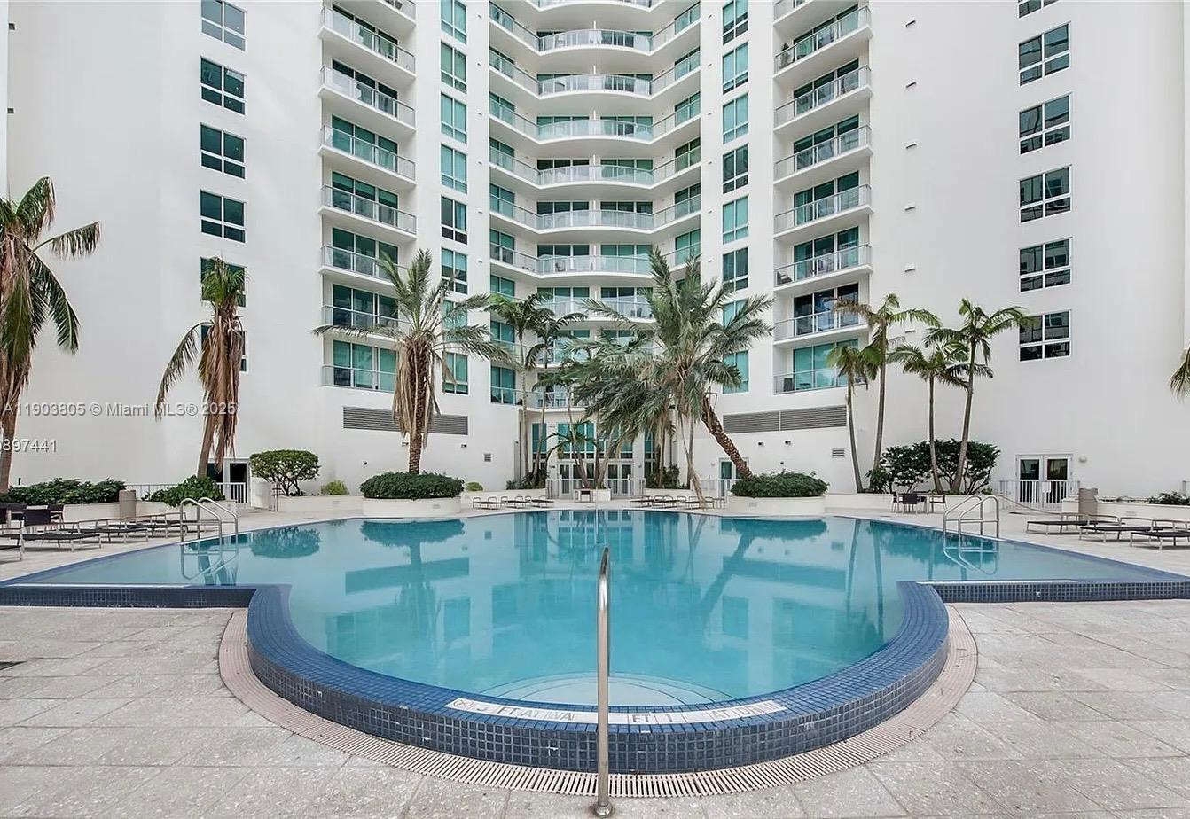 300 South Biscayne Boulevard, Unit L1208 Miami, FL 33131 - Photo 9 of 10 a view of a swimming pool with a view of house