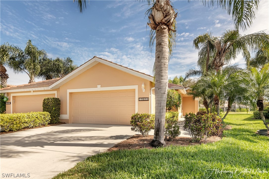 12625 Stone Valley Loop Fort Myers, FL 33913 - Photo 1 of 26 front view of a house with a yard