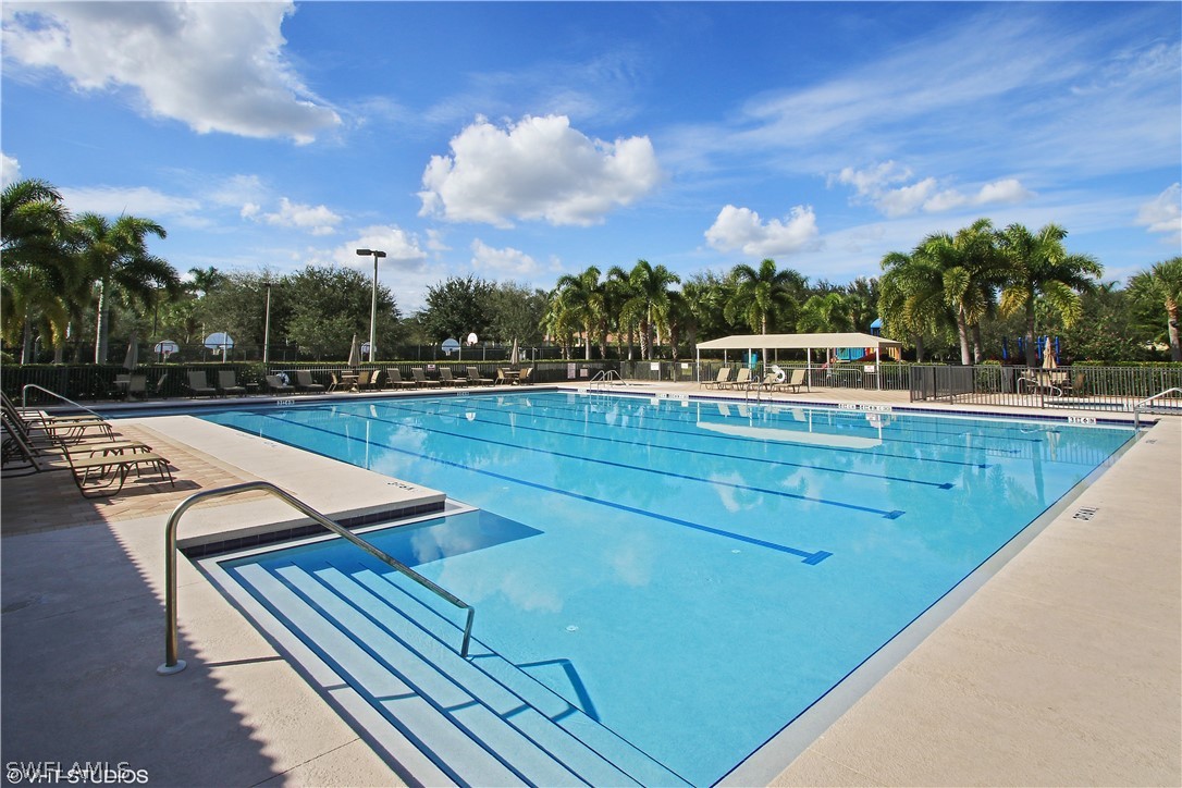 12625 Stone Valley Loop Fort Myers, FL 33913 - Photo 23 of 26 a view of a swimming pool with furniture