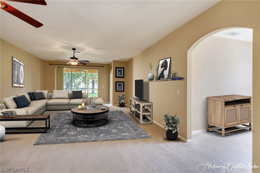 12625 Stone Valley Loop Fort Myers, FL 33913 - Photo 9 of 26 a living room with furniture and a window