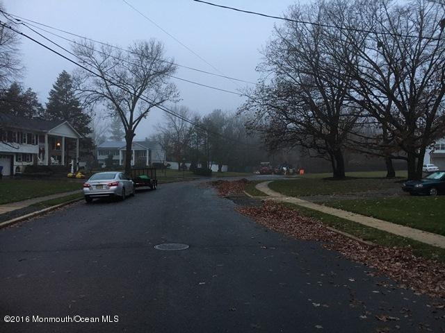 16 Windsor Road Howell, NJ 07731 - Photo 2 of 15 a house with trees in front of it