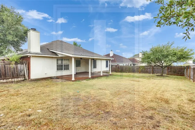 a house with trees in front of it