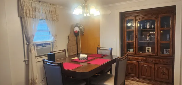 a view of a dining room with furniture
