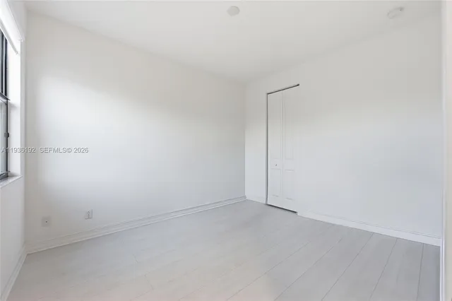 an empty room with an empty door