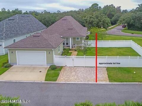 744 South Loop Parkway St. Augustine, FL 32095 - Photo 12 of 14 a view of a back yard of the house