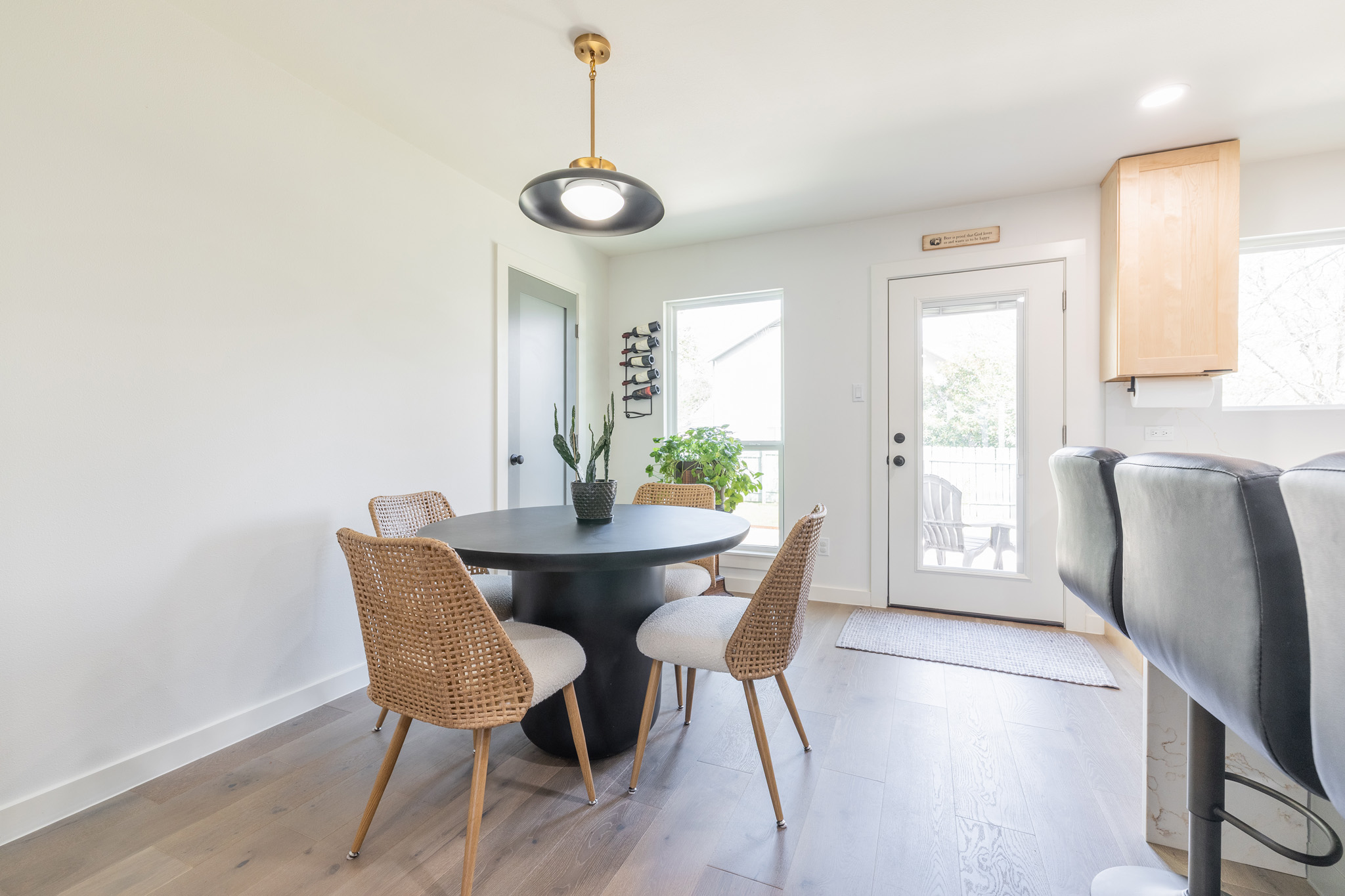 2214 Lear Lane Austin, TX 78745 - Photo 11 of 40 a view of a dining room with furniture and wooden floor