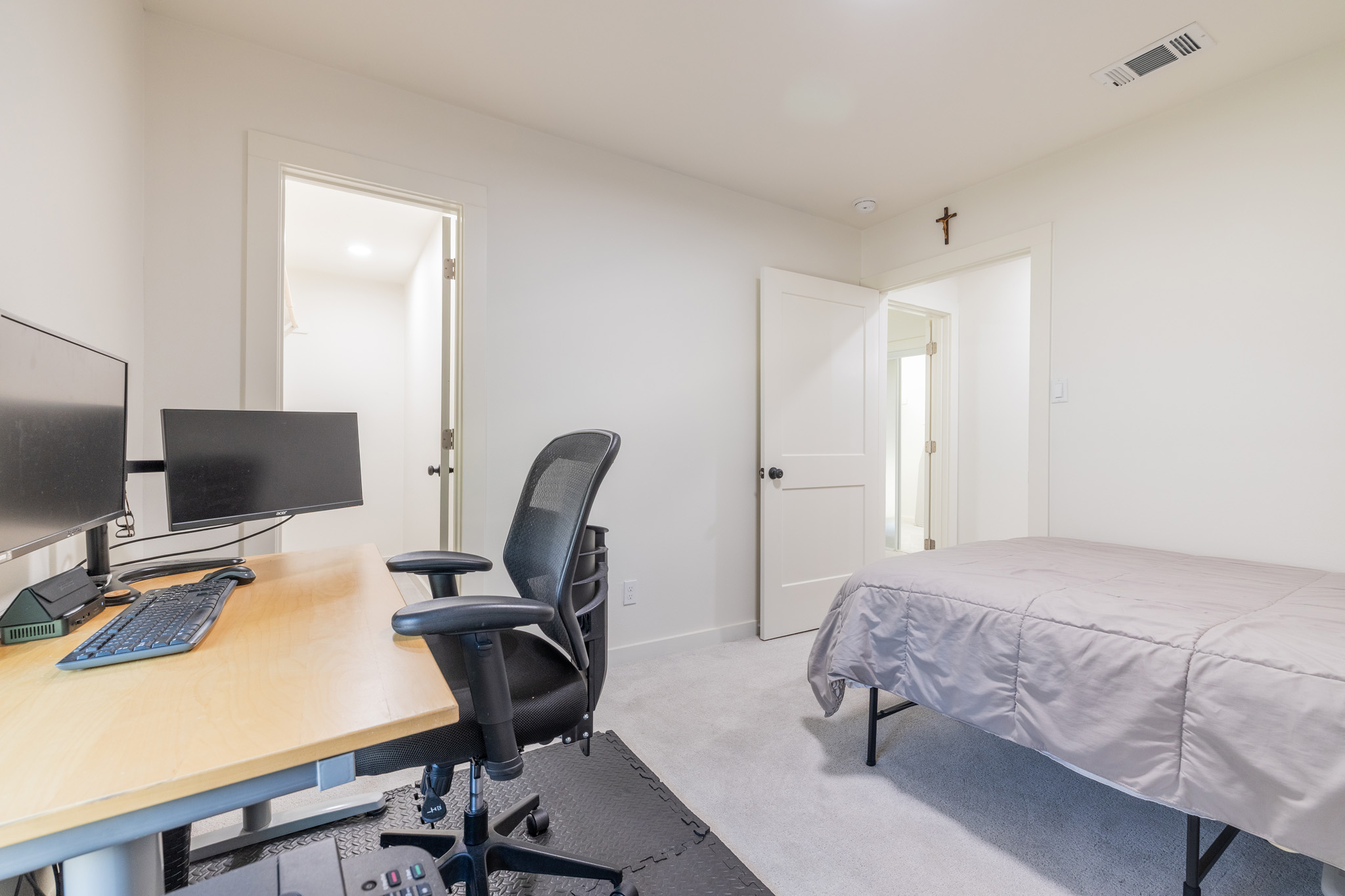 2214 Lear Lane Austin, TX 78745 - Photo 22 of 40 a bedroom with a workspace