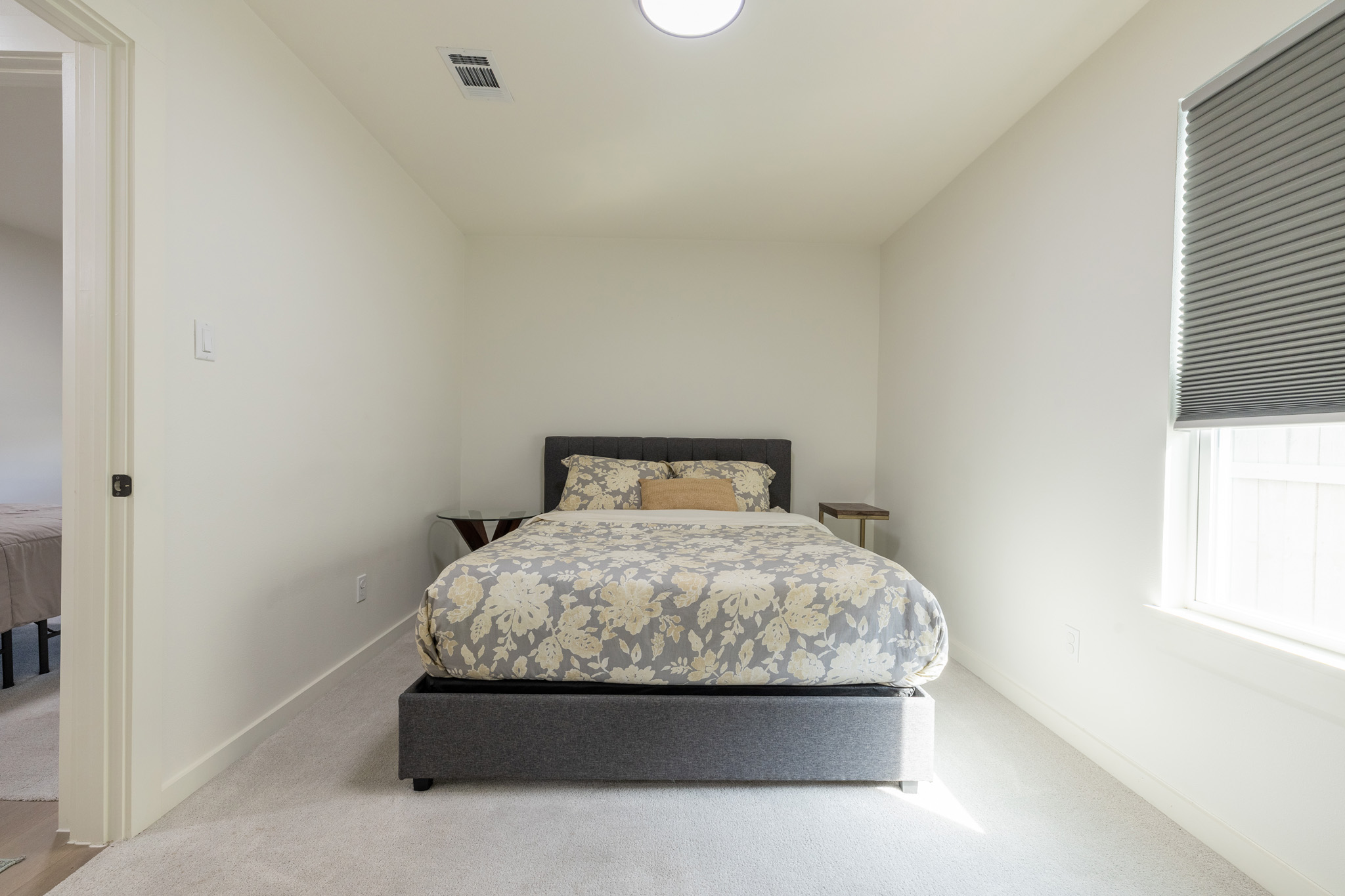 2214 Lear Lane Austin, TX 78745 - Photo 25 of 40 a room with a bed and window