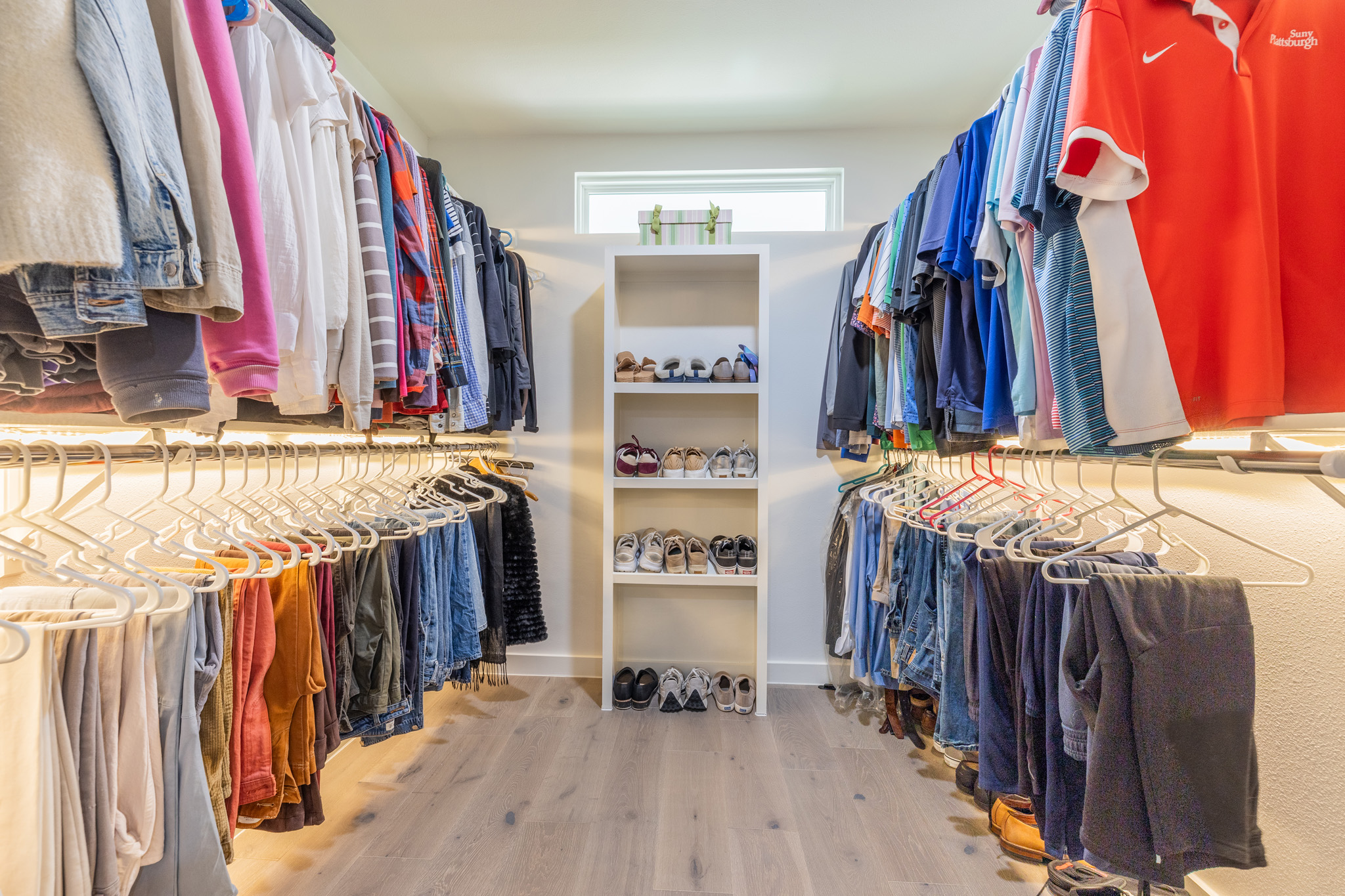 2214 Lear Lane Austin, TX 78745 - Photo 31 of 40 a view of walk in closet with clothes