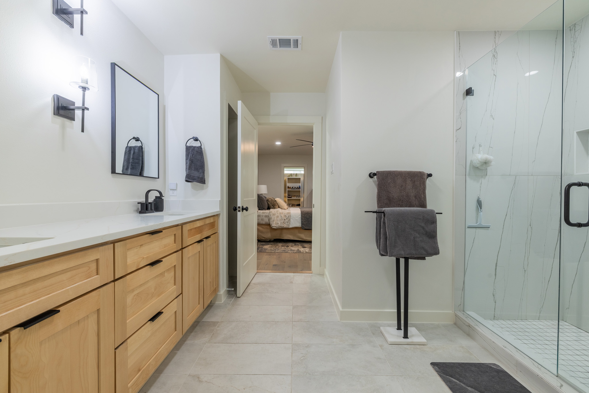 2214 Lear Lane Austin, TX 78745 - Photo 34 of 40 a bathroom with a sink and a mirror