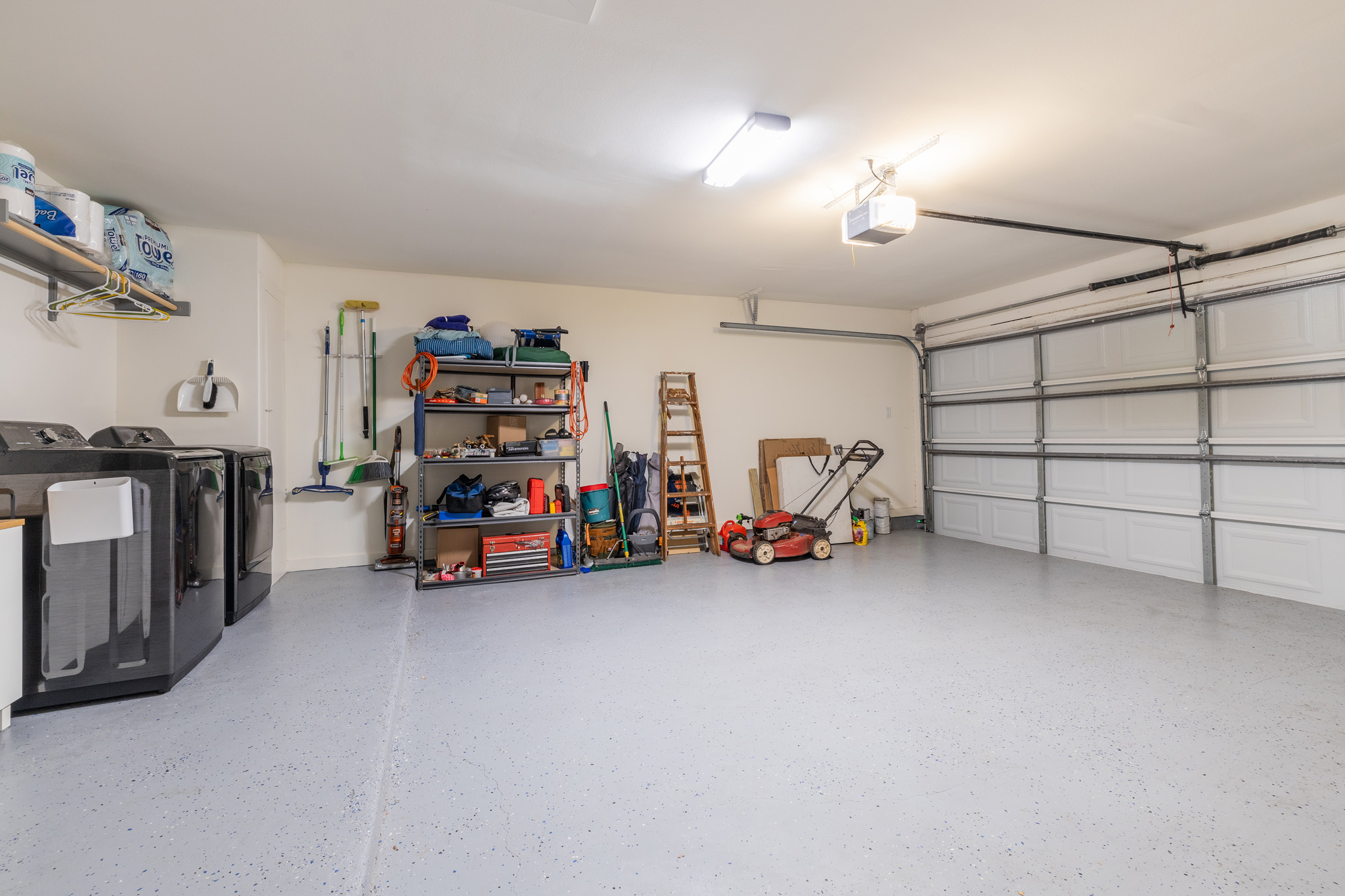 2214 Lear Lane Austin, TX 78745 - Photo 36 of 40 a view of a garage with parked cars