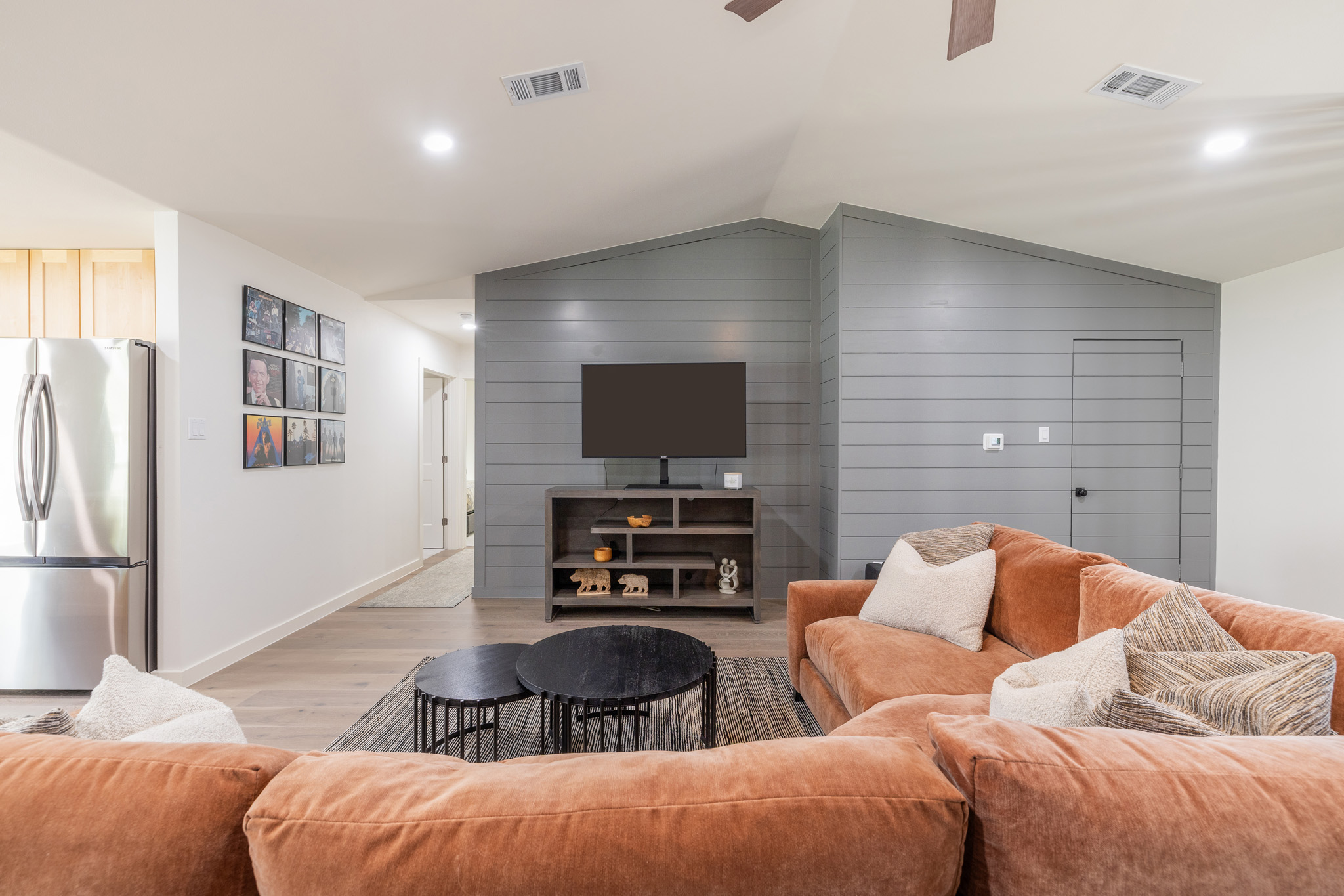 2214 Lear Lane Austin, TX 78745 - Photo 10 of 40 a living room with furniture and a flat screen tv