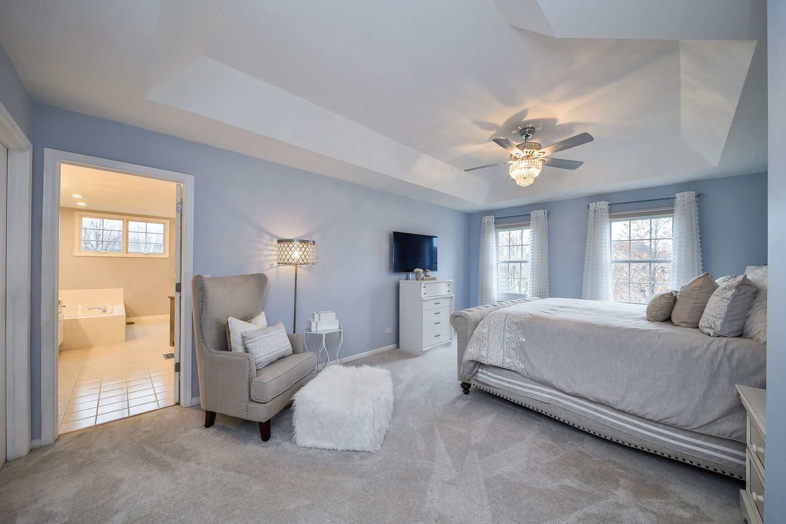 4N403 South Robert Frost Circle St. Charles, IL 60175 - Photo 16 of 29 a bedroom with a bed and a chandelier