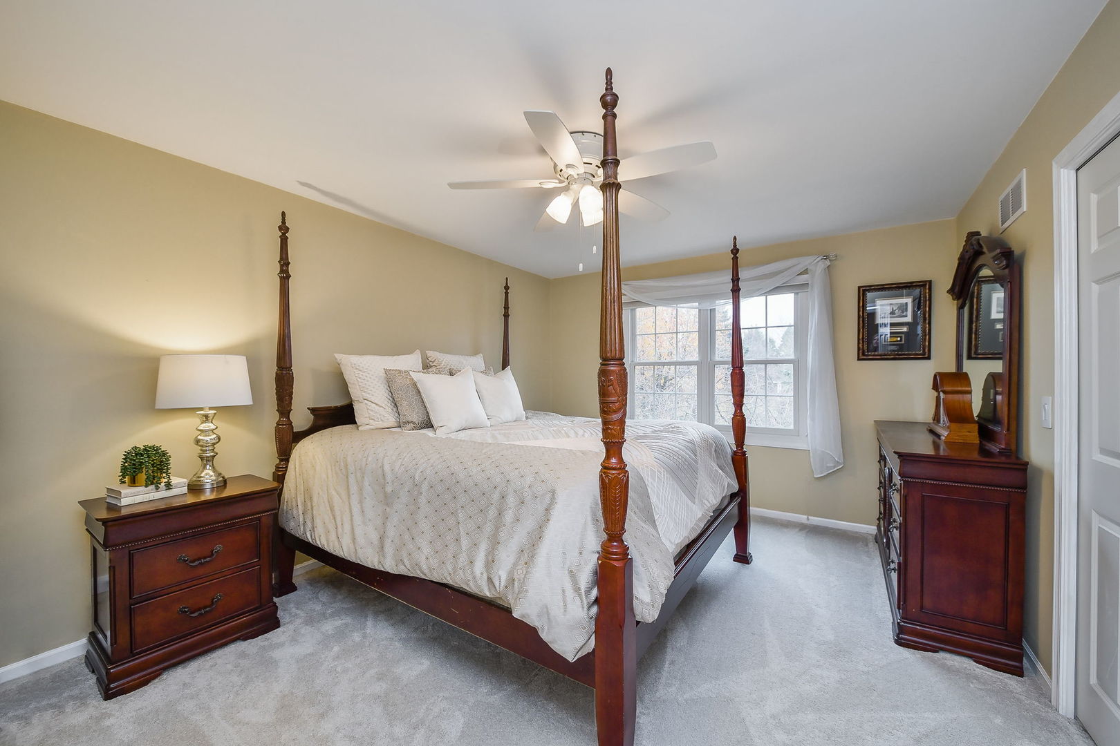 4N403 South Robert Frost Circle St. Charles, IL 60175 - Photo 18 of 29 a bedroom with a bed and wooden floor