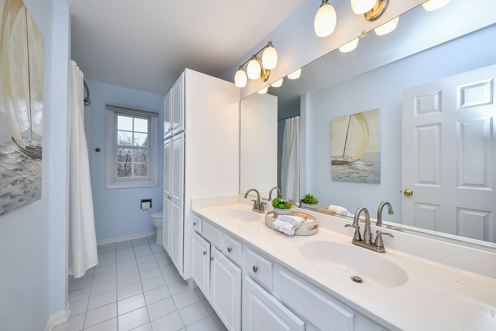 4N403 South Robert Frost Circle St. Charles, IL 60175 - Photo 21 of 29 a spacious bathroom with a double vanity sink mirror and toilet