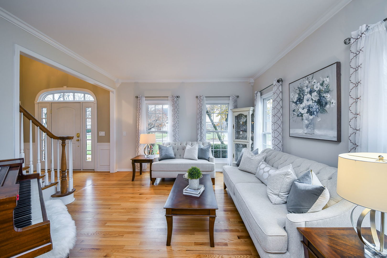 4N403 South Robert Frost Circle St. Charles, IL 60175 - Photo 4 of 29 a living room with furniture floor to ceiling window and wooden floor