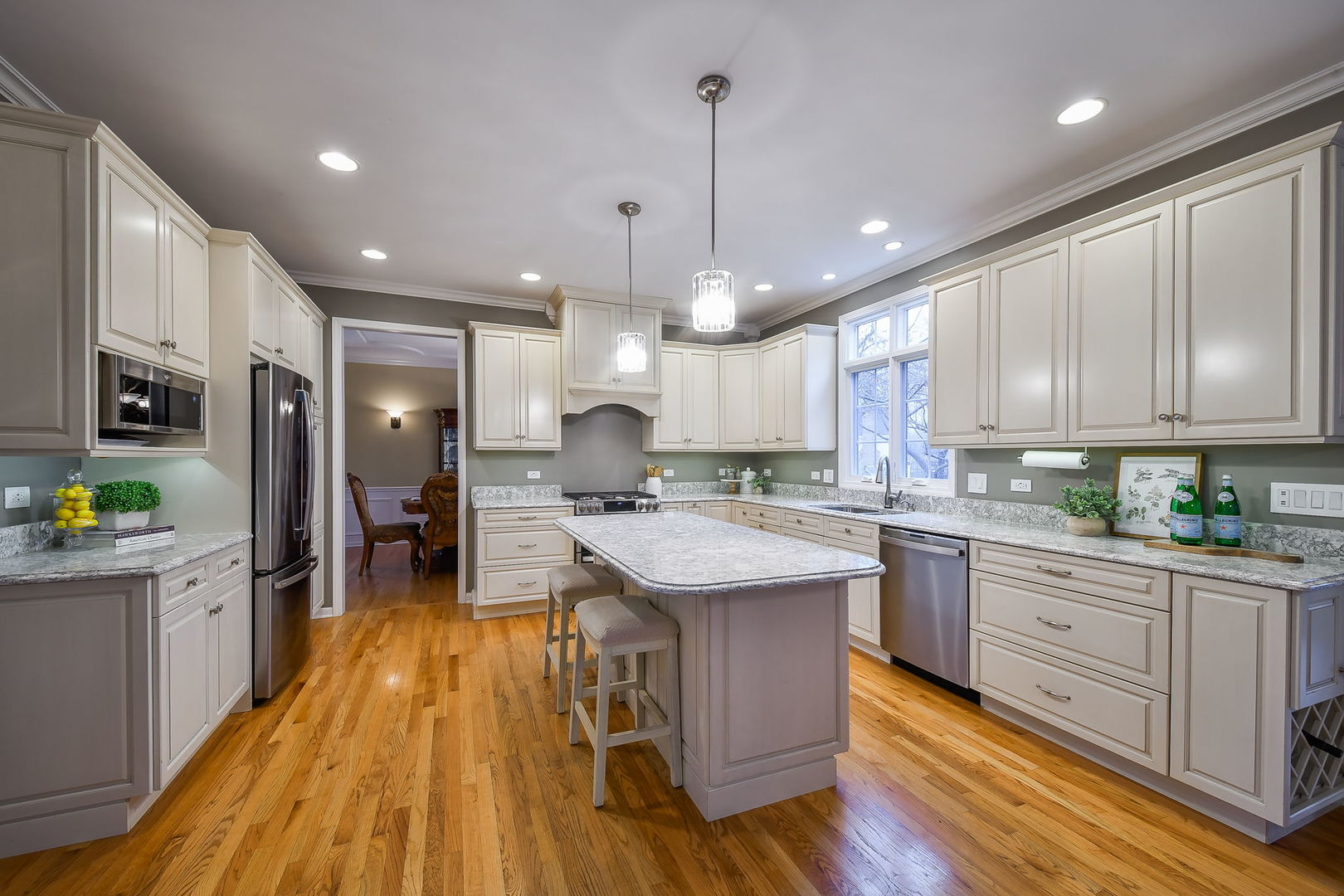 4N403 South Robert Frost Circle St. Charles, IL 60175 - Photo 8 of 29 a kitchen with kitchen island granite countertop a sink a counter top space stainless steel appliances and cabinets