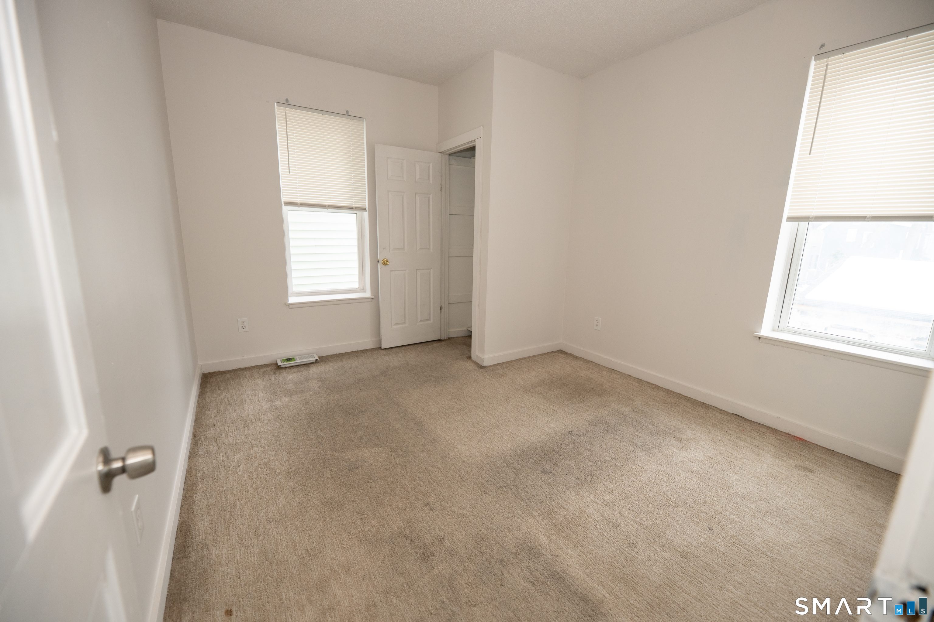 86 Spring Street, Unit 2 West Haven, CT 06516 - Photo 12 of 27 an empty room with windows