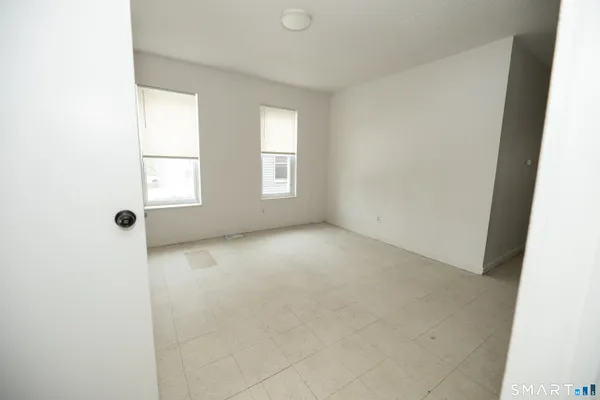 an empty room with windows