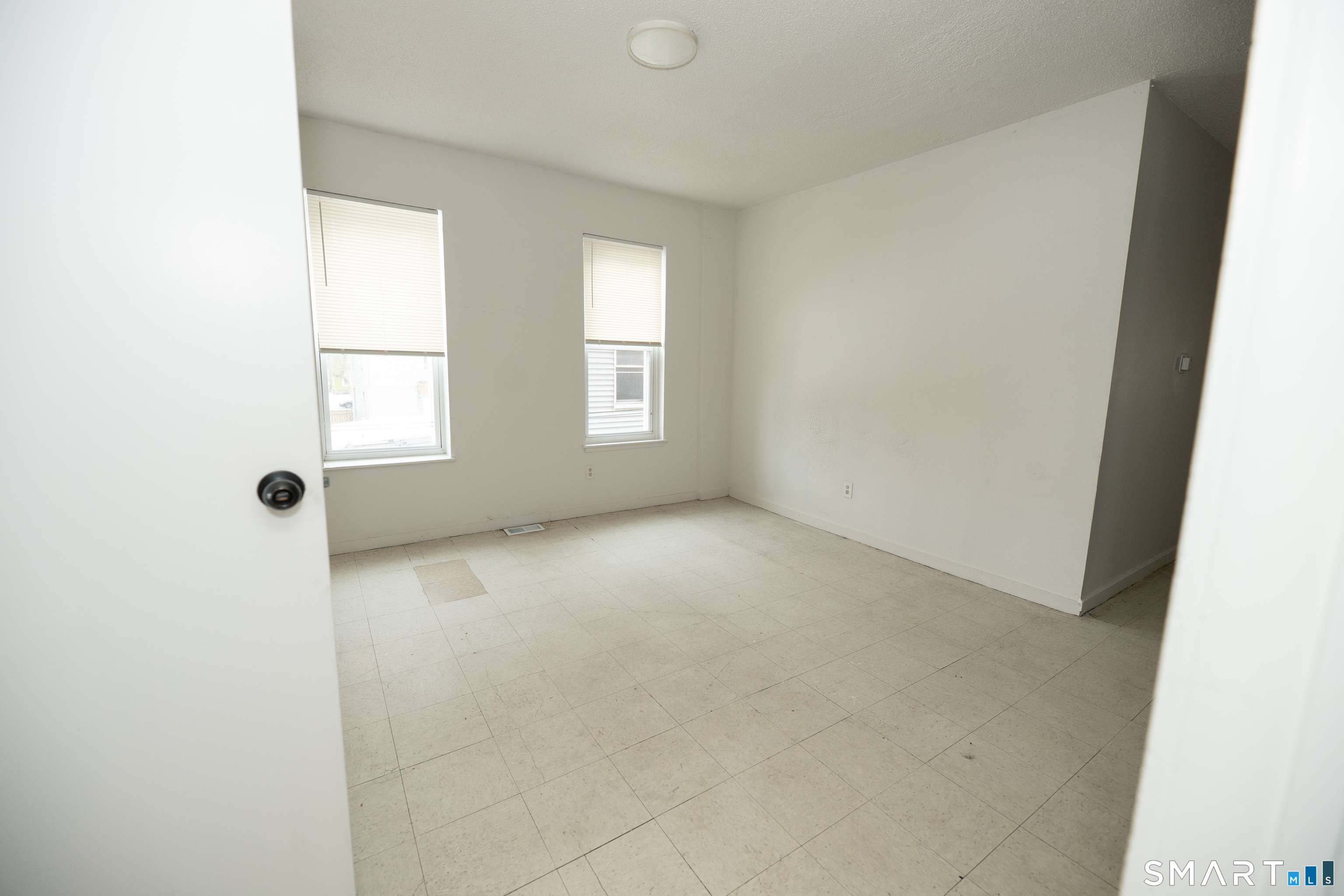 86 Spring Street, Unit 2 West Haven, CT 06516 - Photo 15 of 27 an empty room with windows