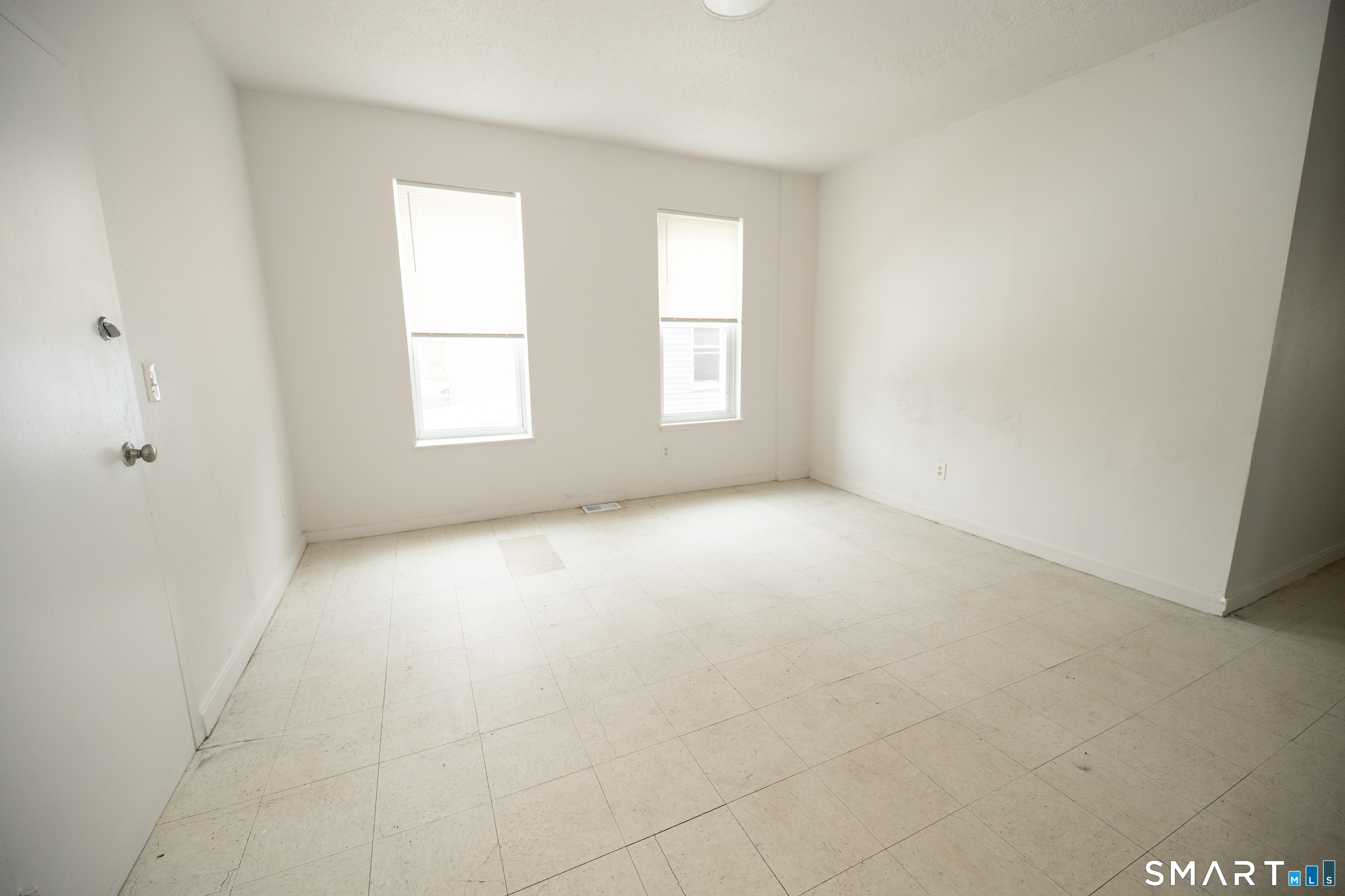 86 Spring Street, Unit 2 West Haven, CT 06516 - Photo 16 of 27 an empty room with windows