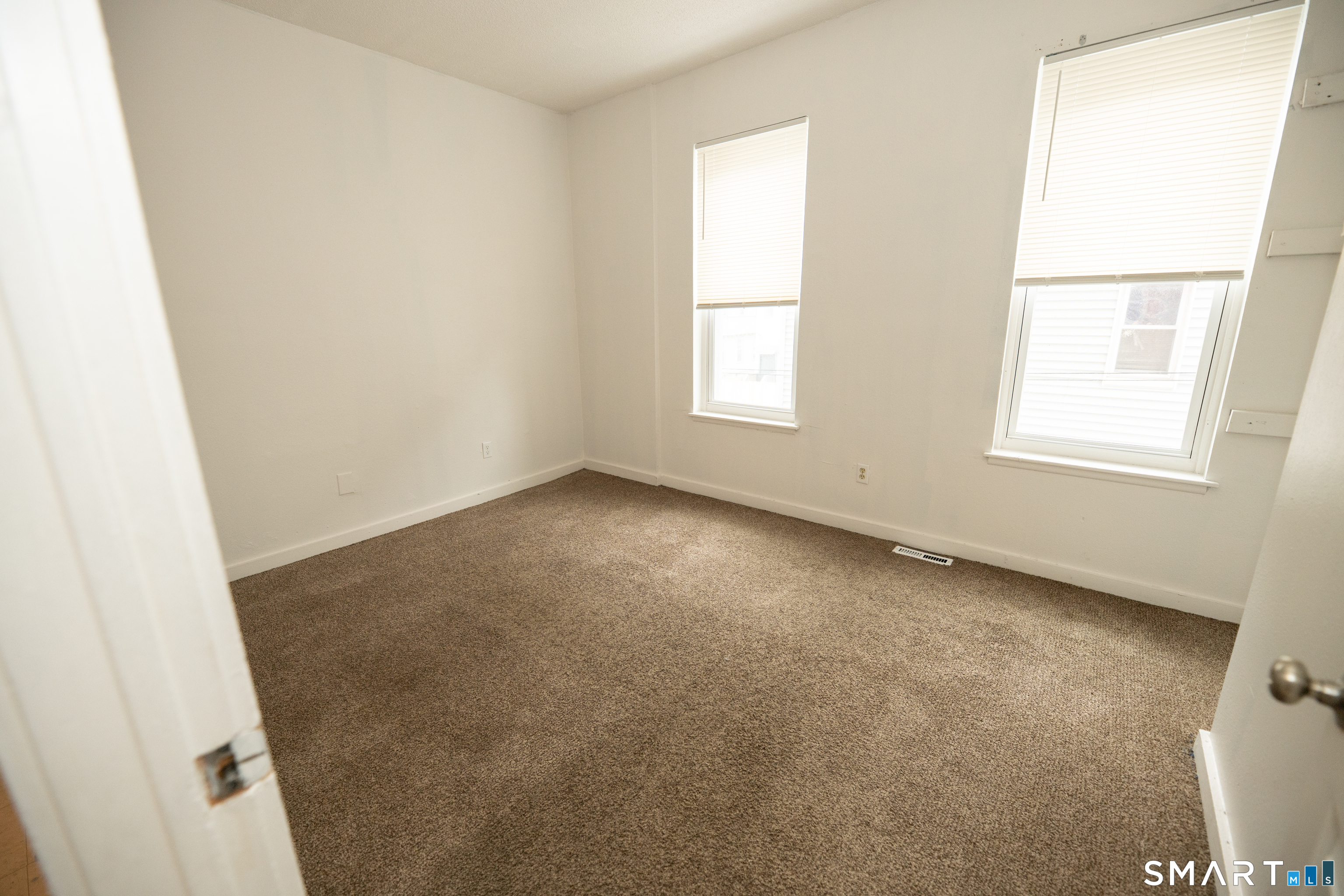 86 Spring Street, Unit 2 West Haven, CT 06516 - Photo 17 of 27 an empty room with a window