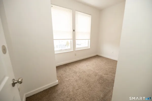 an empty room with a window
